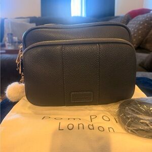 Pom Pom London full grain leather crossbody bag. Slate blue.